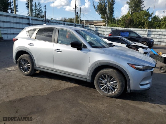 2021 Mazda CX-5 Touring with VIN JM3KFACM5M1327402, listed as a Copart auction lot 46286615 with 33,638 mi miles and Clean Title. Bid and sale history available at carsss.com. Image 4.
