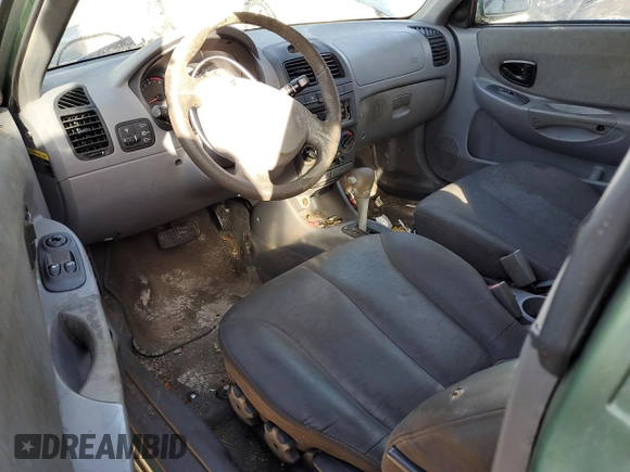 2005 Hyundai Accent GLS with VIN KMHCG35C75U328380, listed as a Copart auction lot 74935354 with 4,848 mi miles and Salvage Title. Bid and sale history available at carsss.com. Image 8.