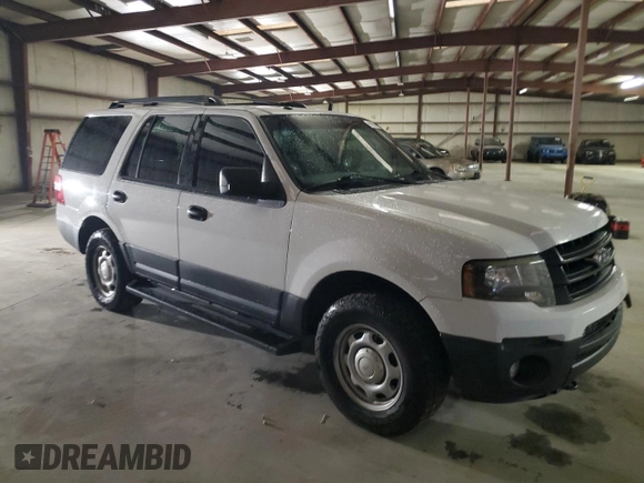 2015 Ford Expedition XL with VIN 1FMJU1GT1FEF13425, listed as a Copart auction lot 60624715 with 133,750 mi miles and Salvage title. Bid and sale history available at DreamBid. Image 4.