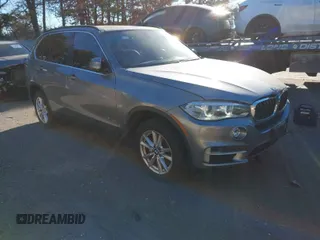 2014 BMW X5 xDrive35i with VIN 5UXKR0C59E0H28690, listed as a IAAI auction lot 41175919 with 114,165 mi miles. Bid and sale history available at carsss.com. Image 1.