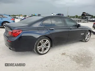 2013 BMW 7 Series 750i with VIN WBAYA8C56DC996704, listed as a Copart auction lot 64466705 with 102,278 mi miles and Salvage title. Bid and sale history available at DreamBid. Image 3.