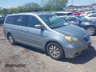 2010 Honda Odyssey EX-L with VIN 5FNRL3H62AB001954, listed as a IAAI auction lot 42028959 with 142,743 mi miles. Bid and sale history available at carsss.com. Image 1.