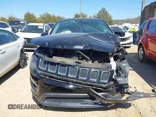 2021 Jeep Compass Latitude with VIN 3C4NJCBB4MT532251, listed as a IAAI auction lot 41889321 with 52,295 mi miles and . Bid and sale history available at DreamBid. Image 12.