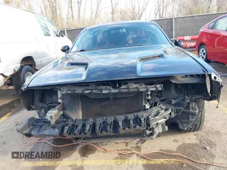 2016 Dodge Challenger SXT with VIN 2C3CDZAG1GH149111, listed as a IAAI auction lot 41863651 with 157,932 mi miles and . Bid and sale history available at DreamBid. Image 6.