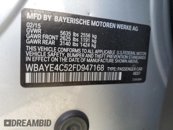 2015 BMW 7 Series 740Li with VIN WBAYE4C52FD947168, listed as a Copart auction lot 71287564 with 103,444 mi miles and Salvage Title. Bid and sale history available at DreamBid. Image 12.