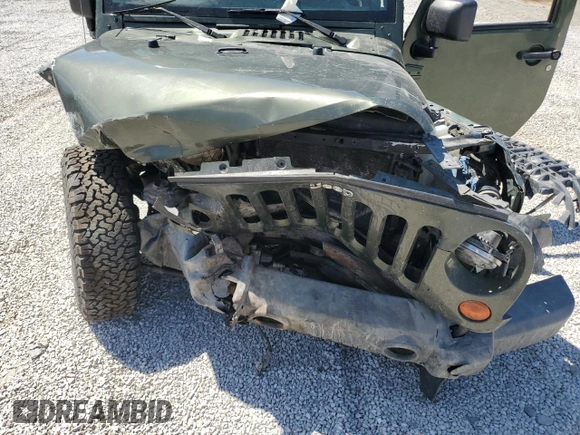 2008 Jeep Wrangler Rubicon z VIN 1J4GA64108L616531, wystawiony jako Copart lot #58363534 z przebiegiem Nie podano mil oraz Szkoda całkowita • Salvage title. Historia ofert i sprzedaży dostępna na DreamBid. Obrazek 12.
