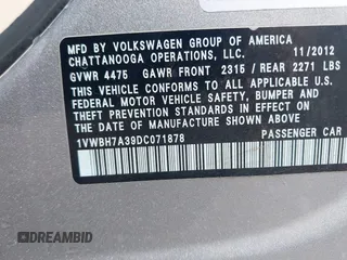 2013 Volkswagen Passat SE w/Sunroof with VIN 1VWBH7A39DC071878, listed as a IAAI auction lot 41903291 with 107,096 mi miles. Bid and sale history available at carsss.com. Image 9.