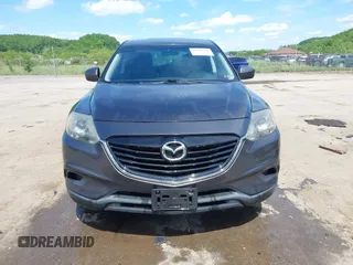 2014 Mazda CX-9 Touring with VIN JM3TB3CV9E0426767, listed as a IAAI auction lot 42301021 with 129,497 mi miles and . Bid and sale history available at DreamBid. Image 13.