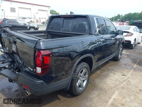2023 Honda Ridgeline RTL-E with VIN 5FPYK3F76PB042100, listed as a IAAI auction lot 42274861 with 16,822 mi miles and . Bid and sale history available at DreamBid. Image 4.