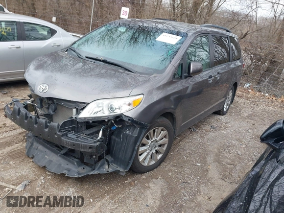 2015 Toyota Sienna Ltd with VIN 5TDDK3DCXFS100341, listed as a IAAI auction lot 41245558 with 114,854 mi miles. Bid and sale history available at carsss.com. Image 2.