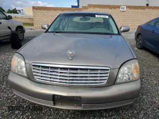 2001 Cadillac DeVille z VIN 1G6KD54Y61U248616, wystawiony jako Copart lot #47057095 z przebiegiem 110 009 mil mil oraz Czysty tytuł • Clean title. Historia ofert i sprzedaży dostępna na DreamBid. Obrazek 5.