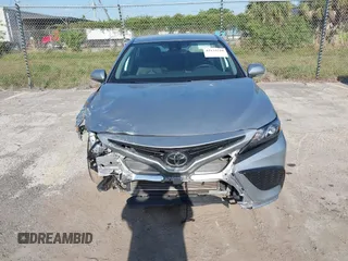 2023 Toyota Camry SE with VIN 4T1G11AK5PU750719, listed as a IAAI auction lot 42133210 with 55,688 mi miles. Bid and sale history available at carsss.com. Image 12.