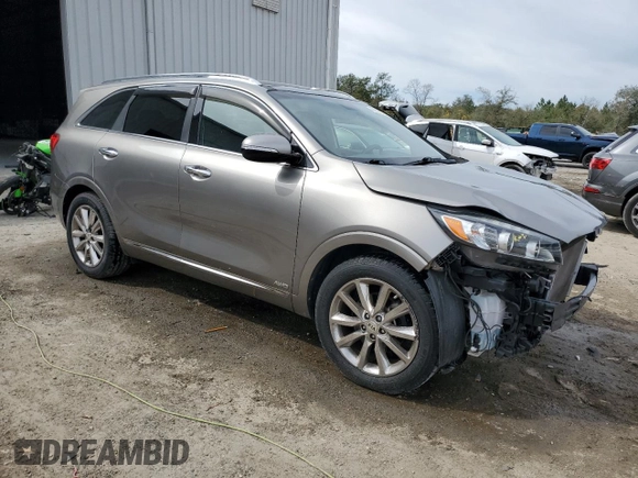 2016 Kia Sorento SXL with VIN 5XYPKDA52GG152814, listed as a Copart auction lot 44903395 with 77,479 mi miles and Salvage title. Bid and sale history available at DreamBid. Image 4.
