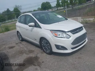 2017 Ford C-Max Titanium z VIN 1FADP5FU1HL100046, wystawiony jako IAAI lot #42356813 z przebiegiem 57 737 mil mil oraz . Historia ofert i sprzedaży dostępna na DreamBid. Obrazek 1.