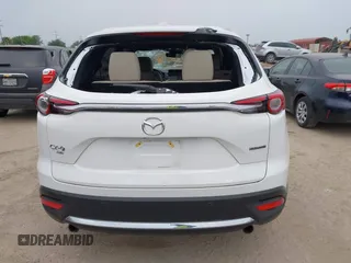 2023 Mazda CX-9 Grand Touring с VIN JM3TCBDY0P0634099, выставлен на аукционе IAAI как лот 41943704 с пробегом 5 615 миль миль и . История ставок и продаж доступна на DreamBid. Изображение 16.