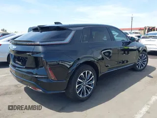 2024 Cadillac LYRIQ Sport z VIN 1GYKPVRK6RZ131099, wystawiony jako IAAI lot #41979330 z przebiegiem 3953 mil mil oraz . Historia ofert i sprzedaży dostępna na DreamBid. Obrazek 4.