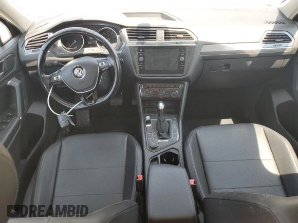 2018 Volkswagen Tiguan SEL с VIN 3VV2B7AX9JM095648, выставлен на аукционе Copart как лот 62558265 с пробегом 104 498 миль миль и Списание • Salvage title. История ставок и продаж доступна на DreamBid. Изображение 8.