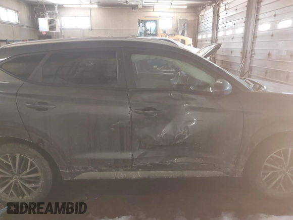 2019 Hyundai Tucson Ultimate with VIN KM8J3CAL0KU063161, listed as a IAAI auction lot 41606894 with 56,037 mi miles. Bid and sale history available at carsss.com. Image 13.