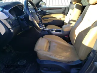 2014 Cadillac SRX Premium Collection z VIN 3GYFNGE37ES566089, wystawiony jako Copart lot #83595454 z przebiegiem 209 155 mil mil oraz Szkody całkowita. Historia ofert i sprzedaży dostępna na DreamBid. Obrazek 7.