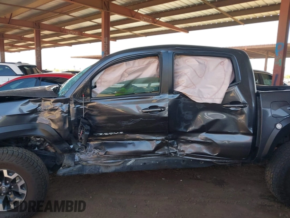 2022 Toyota Tacoma SR z VIN 3TYCZ5AN1NT062445, wystawiony jako IAAI lot #41967336 z przebiegiem Nie podano mil oraz . Historia ofert i sprzedaży dostępna na DreamBid. Obrazek 14.