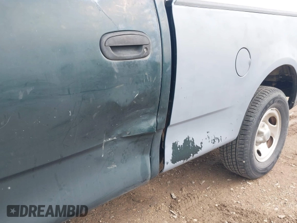 2001 Ford F-150 XL with VIN 3FTZF17271MA82150, listed as a IAAI auction lot 42664544 with 199,156 mi miles and . Bid and sale history available at DreamBid. Image 12.