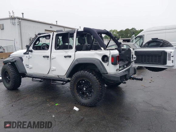 2018 Jeep Wrangler Unlimited Sport with VIN 1C4HJXDG0JW233696, listed as a IAAI auction lot 42523474 with 66,961 mi miles and . Bid and sale history available at DreamBid. Image 3.