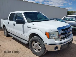 2014 Ford F-150 XL with VIN 1FTEW1CM7EKG57737, listed as a IAAI auction lot 42046953 with 145,796 mi miles. Bid and sale history available at carsss.com. Image 1.