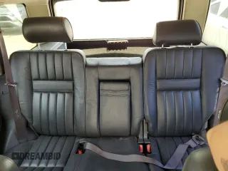 1999 Land Rover Range Rover z VIN SALPV1442XA426711, wystawiony jako Copart lot #57434985 z przebiegiem 253 151 mil mil oraz Tytuł czysty. Historia ofert i sprzedaży dostępna na DreamBid. Obrazek 10.