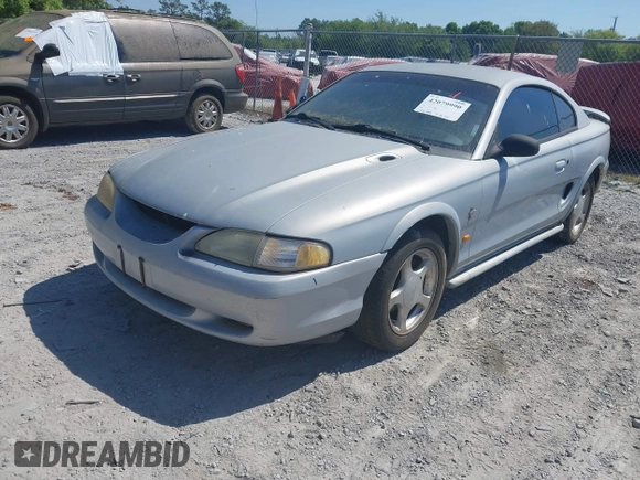 1995 Ford Mustang with VIN 1FALP4047SF170414, listed as a IAAI auction lot 42079990 with 106,398 mi miles. Bid and sale history available at carsss.com. Image 2.