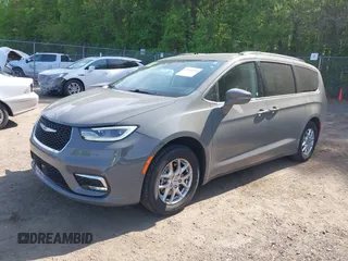 2022 Chrysler Pacifica Touring L with VIN 2C4RC1BG3NR168565, listed as a IAAI auction lot 42150290 with 61,750 mi miles and . Bid and sale history available at DreamBid. Image 21.