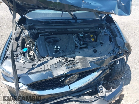 2020 Mazda CX-5 Grand Touring with VIN JM3KFADM9L1837183, listed as a IAAI auction lot 42340628 with 81,975 mi miles and . Bid and sale history available at DreamBid. Image 10.