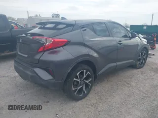2018 Toyota C-HR XLE z VIN NMTKHMBX9JR044367, wystawiony jako IAAI lot #42116714 z przebiegiem 124 597 mil mil oraz . Historia ofert i sprzedaży dostępna na DreamBid. Obrazek 4.