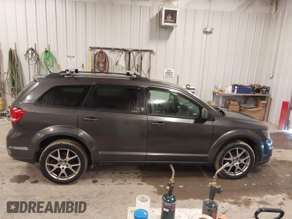 2017 Dodge Journey GT with VIN 3C4PDDEG4HT615357, listed as a IAAI auction lot 41672815 with 115,649 mi miles and . Bid and sale history available at DreamBid. Image 13.