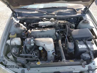 2000 Toyota Camry CE z VIN JT2BG22K6Y0433633, wystawiony jako IAAI lot #42409568 z przebiegiem 119 672 mil mil oraz . Historia ofert i sprzedaży dostępna na DreamBid. Obrazek 10.