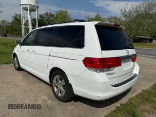 2010 Honda Odyssey Touring with VIN 5FNRL3H94AB047330, listed as a Copart auction lot 54064195 with 193,979 mi miles and Clean Title. Bid and sale history available at carsss.com. Image 3.