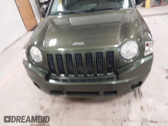 2008 Jeep Compass Sport with VIN 1J8FF47W28D534267, listed as a IAAI auction lot 42009243 with 122,720 mi miles and . Bid and sale history available at carsss.com. Image 12.