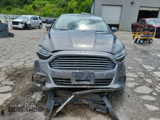 2013 Ford Fusion SE Hybrid with VIN 3FA6P0LU2DR329816, listed as a Copart auction lot 64308255 with 217,157 mi miles and Salvage title. Bid and sale history available at DreamBid. Image 5.