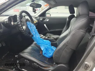 2005 Nissan 350Z Touring z VIN JN1AZ34E05M654954, wystawiony jako Copart lot #57591085 z przebiegiem Nie podano mil oraz Tytuł czysty. Historia ofert i sprzedaży dostępna na DreamBid. Obrazek 7.