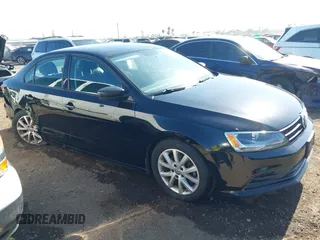 2015 Volkswagen Jetta SE z VIN 3VWD17AJ1FM285115, wystawiony jako IAAI lot #42225578 z przebiegiem 109 077 mil mil oraz . Historia ofert i sprzedaży dostępna na DreamBid. Obrazek 1.