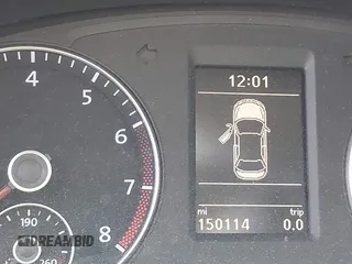 2014 Volkswagen Passat SE z VIN 1VWBT7A39EC073971, wystawiony jako IAAI lot #42266759 z przebiegiem 150 114 mil mil oraz . Historia ofert i sprzedaży dostępna na DreamBid. Obrazek 7.