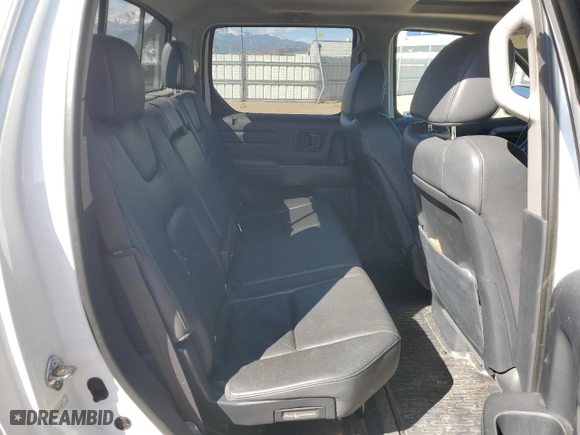 2014 Honda Ridgeline SE with VIN 5FPYK1F63EB011671, listed as a Copart auction lot 48214325 with 81,148 mi miles and Salvage Title. Bid and sale history available at carsss.com. Image 10.