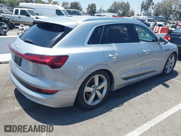 2019 Audi e-tron Prestige with VIN WA1VAAGE9KB010814, listed as a IAAI auction lot 42632795 with 90,497 mi miles and . Bid and sale history available at DreamBid. Image 4.