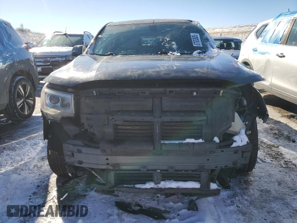 2018 GMC Acadia SLE with VIN 1GKKNRLA2JZ108348, listed as a Copart auction lot 87833005 with 130,403 mi miles and Salvage title. Bid and sale history available at DreamBid. Image 5.