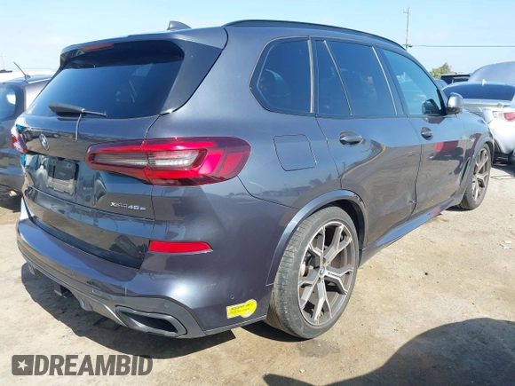 2022 BMW X5 xDrive45e with VIN 5UXTA6C07N9J29881, listed as a IAAI auction lot 42086373 with 63,510 mi miles and . Bid and sale history available at DreamBid. Image 4.