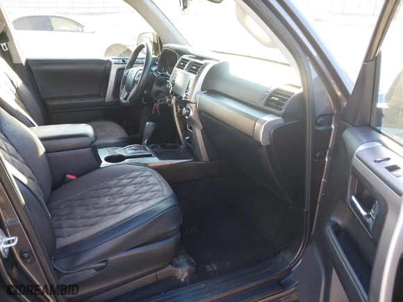 2021 Toyota 4Runner SR5 with VIN JTEEU5JRXM5235997, listed as a IAAI auction lot 41185640 with 68,445 mi miles. Bid and sale history available at carsss.com. Image 5.