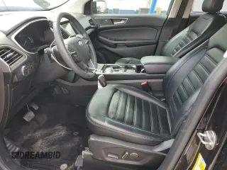 2019 Ford Edge SEL z VIN 2FMPK3J99KBB21856, wystawiony jako Copart lot #53104645 z przebiegiem 98 419 mil mil oraz Szkoda całkowita • Salvage title. Historia ofert i sprzedaży dostępna na DreamBid. Obrazek 7.