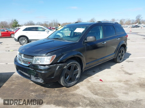 2012 Dodge Journey Crew with VIN 3C4PDCDGXCT257072, listed as a IAAI auction lot 41934176 with 148,339 mi miles and . Bid and sale history available at DreamBid. Image 2.