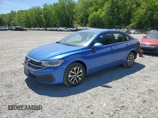 2023 Volkswagen Jetta S with VIN 3VW5M7BU6PM042471, listed as a Copart auction lot 56950155 with 7,043 mi miles and Salvage title. Bid and sale history available at DreamBid. Image 1.