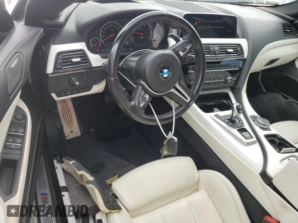 2016 BMW M6 with VIN WBS6E9C55GGF92676, listed as a Copart auction lot 77663924 with 36,548 mi miles and Salvage title. Bid and sale history available at DreamBid. Image 8.