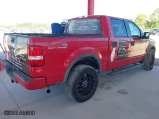 2004 Ford F-150 XLT with VIN 1FTPW14544FA27147, listed as a IAAI auction lot 41822740 with 157,925 mi miles. Bid and sale history available at carsss.com. Image 4.